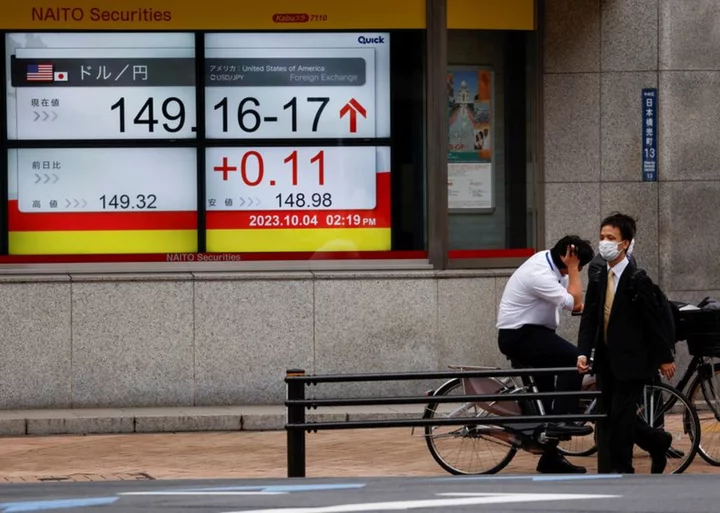 Asian stocks waver, yen wobbles as BOJ takes centre stage
