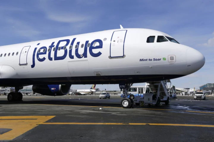JetBlue warns of a possible 3Q loss as it ends a deal with American and faces flight disruptions