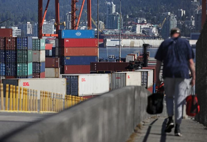 Some dock workers, employers in Canada's Pacific port reach tentative deal