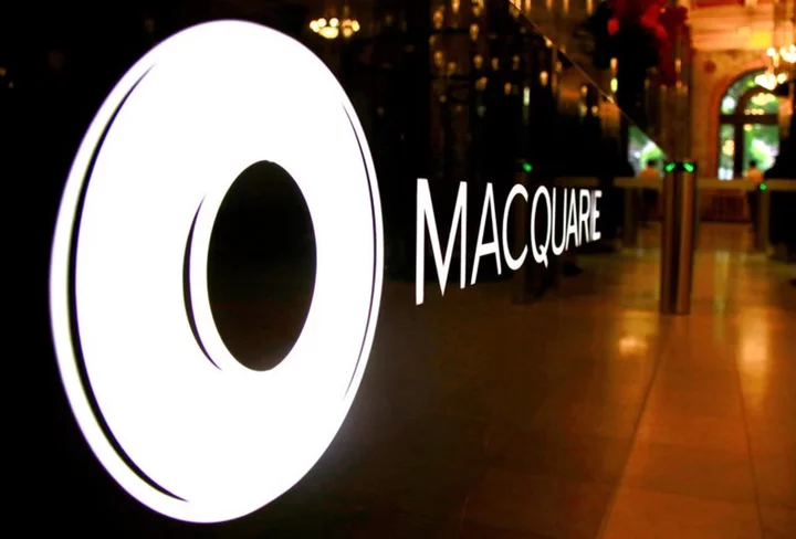 Macquarie flags lower profit on weak green energy income, shares slip