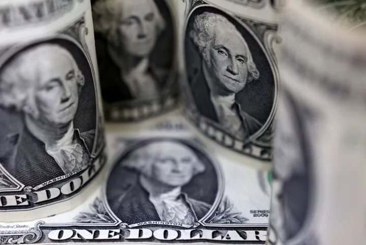 Dollar down as markets bet Fed done with hikes