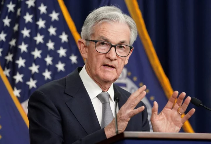 Fed's Powell says balance sheet rundown will proceed without change for now