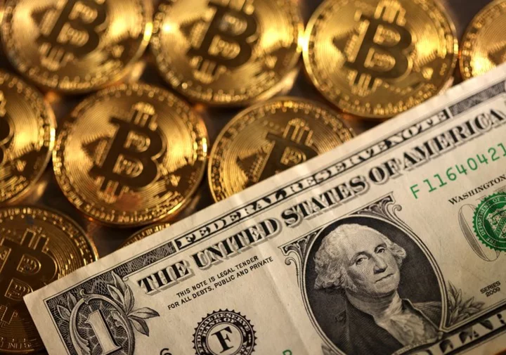 Dollar edges lower ahead of key US data, bitcoin back in spotlight