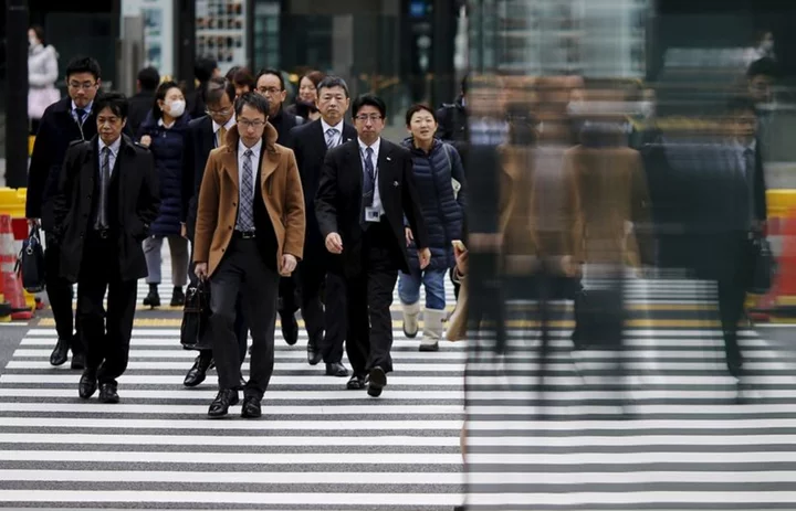 Japan says sees pick up in business sentiment for the first time in 7 months