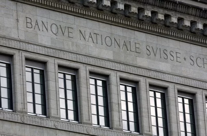 Swiss central bank raises rates again, signals may need to do more