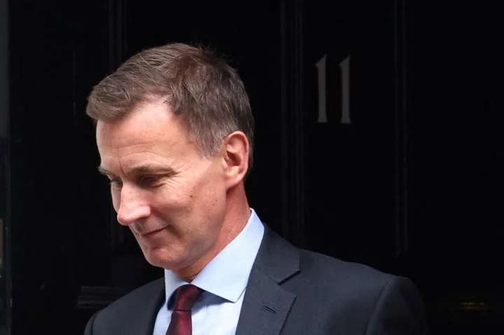 UK's Hunt to cut National Insurance rate in boost for millions of workers