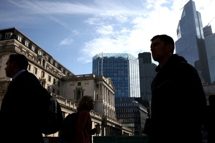 Bank of England says UK economy is coping with higher rates