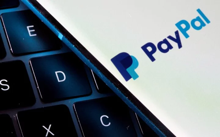 PayPal allays growth fears after raising annual profit forecast
