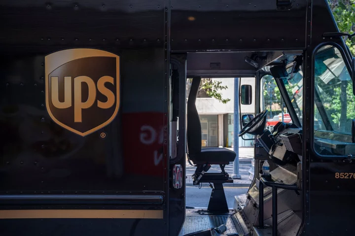 UPS Cuts Forecast With Labor Costs Set to Rise After Union Deal