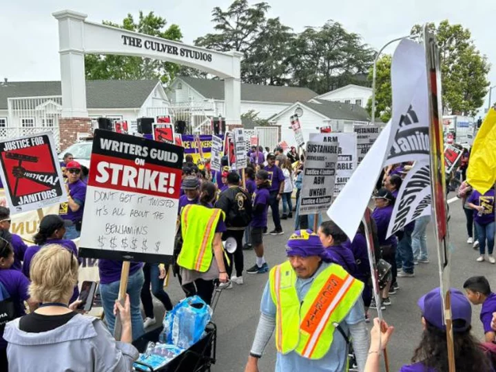 Janitors who lost jobs during WGA strike join picket line