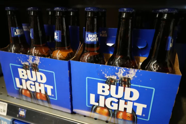 Bud Light maker Anheuser-Busch lays off hundreds of US corporate workers after sales slump