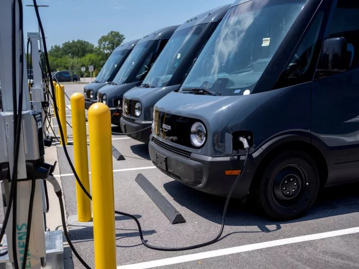 Amazon says it has 10,000 Rivian electric vans in its delivery fleet
