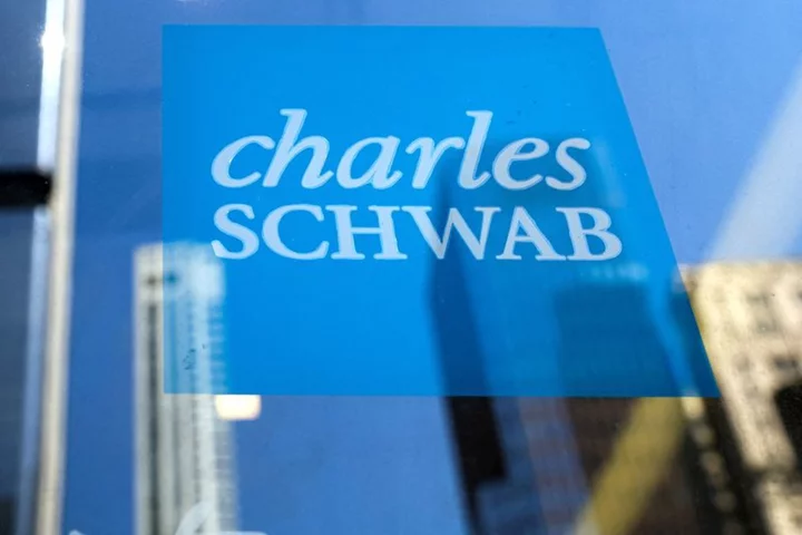 Charles Schwab shares fall after announcing cost-cutting plan