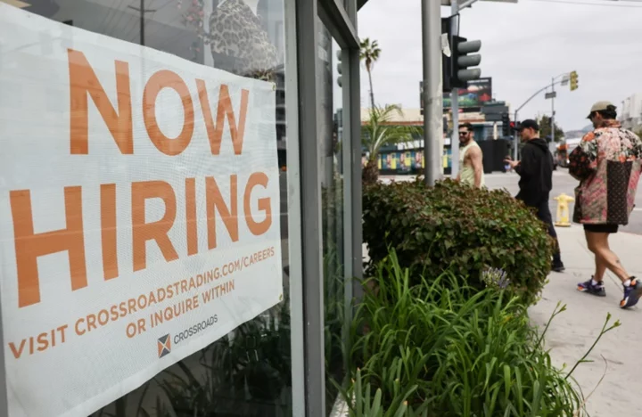 US hiring cooler than expected in July but wage gains hold steady
