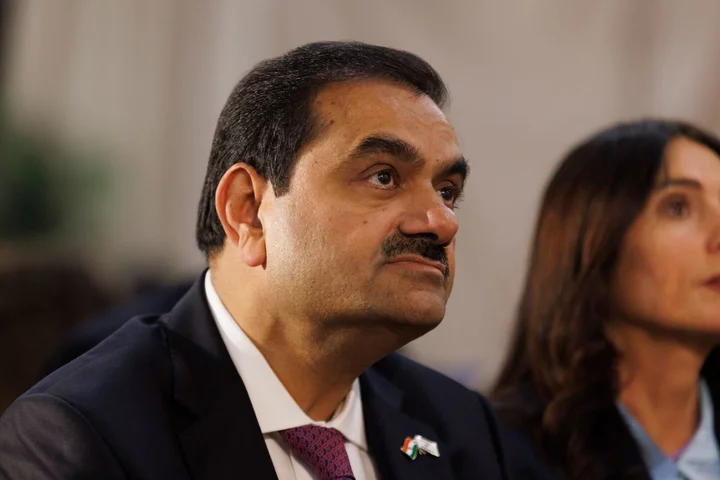 Bain Agrees to Buy Stake in Adani Capital as Billionaire Exits