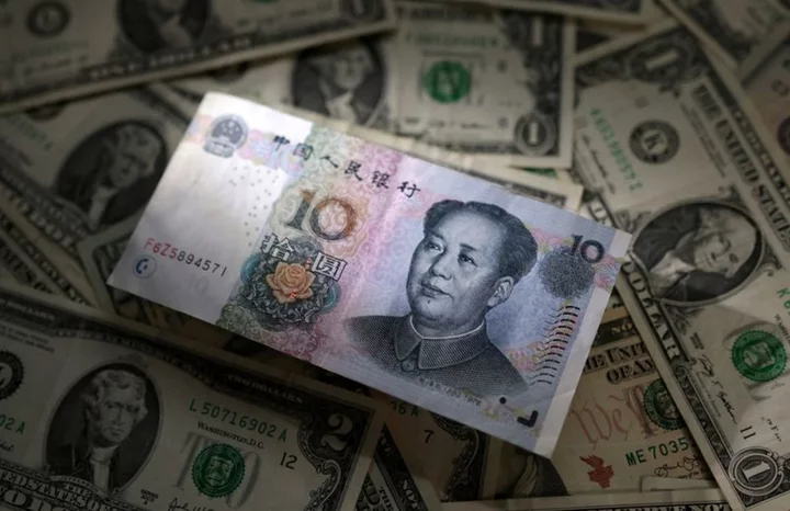 Exclusive-China's state banks seen swapping and selling dollars for yuan -sources