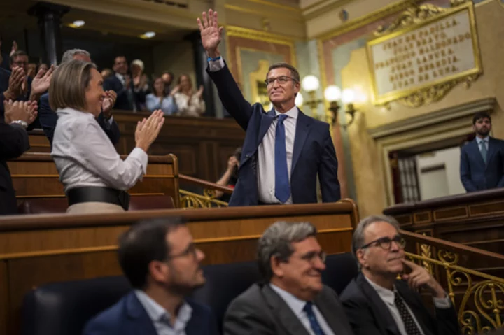 Leader of Spain's conservative tries to form government and slams alleged amnesty talks for Catalans