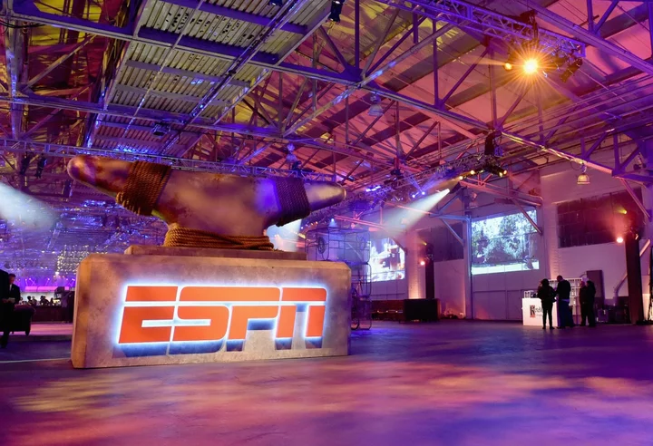 Disney Taps Two Former Executives to Help Sell ESPN Stake