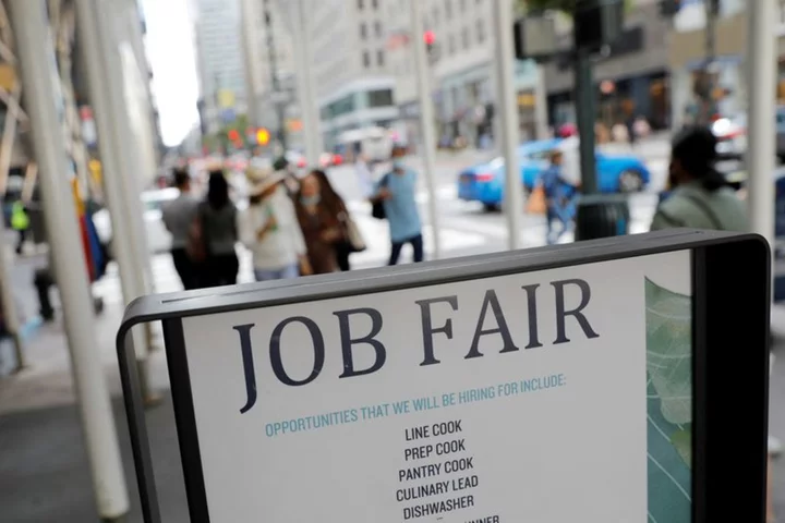 US weekly jobless claims fall; business spending on equipment softening