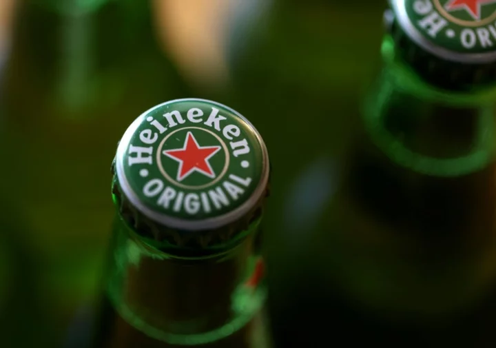 Heineken warns of slowdown in consumer demand