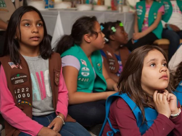 This Girl Scout troop sells cookies to support girls experiencing homelessness