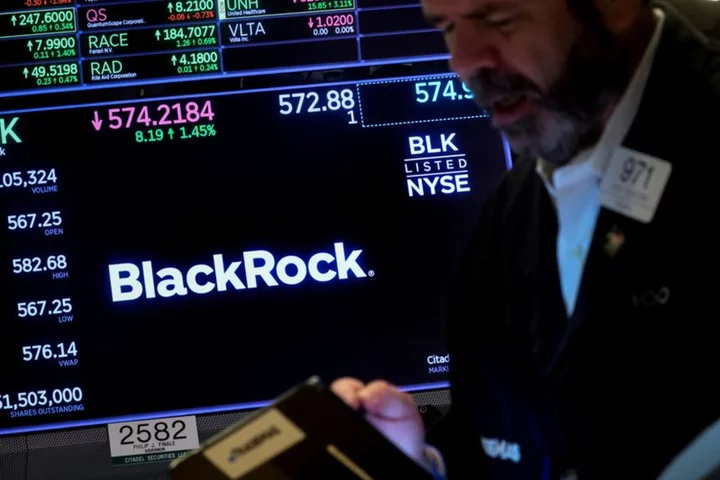 BlackRock posts surprise rise in profit, inflows drop