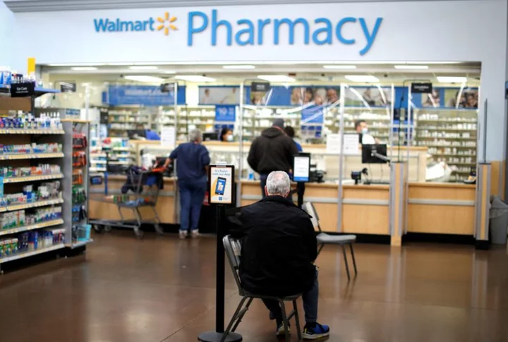 Exclusive-Walmart cuts pharmacist pay, hours while workload piles up