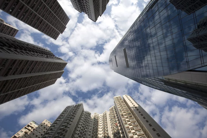 Hong Kong’s Regulator Buys 12 Floors From Swire Properties