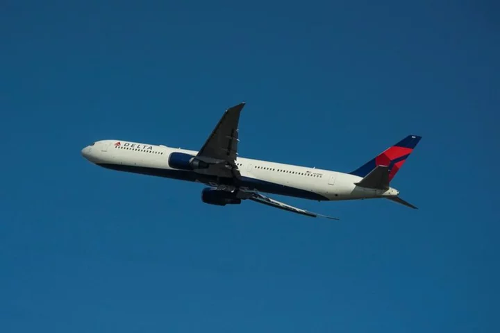 Delta Air cuts third-quarter profit forecast