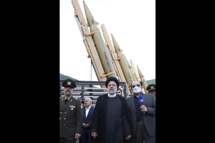 Britain, France and Germany say they will keep their nuclear and missiles sanctions on Iran