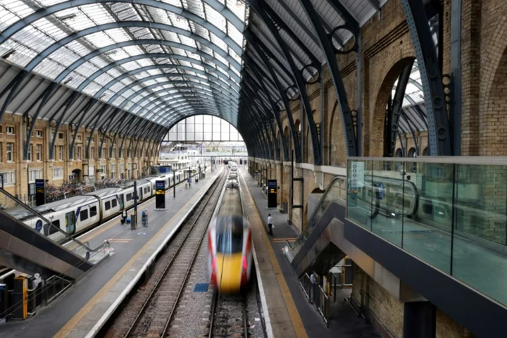UK's RMT union members accept pay deal to end long-running rail strikes