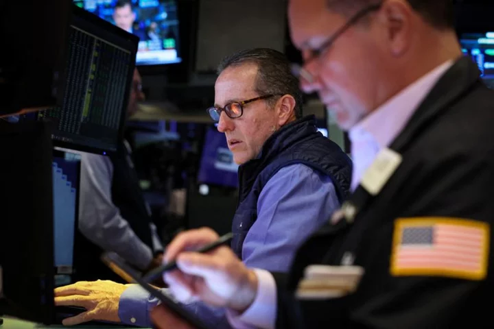 Futures mixed as chip equipment, auto stocks decline; rate-pause hopes support sentiment