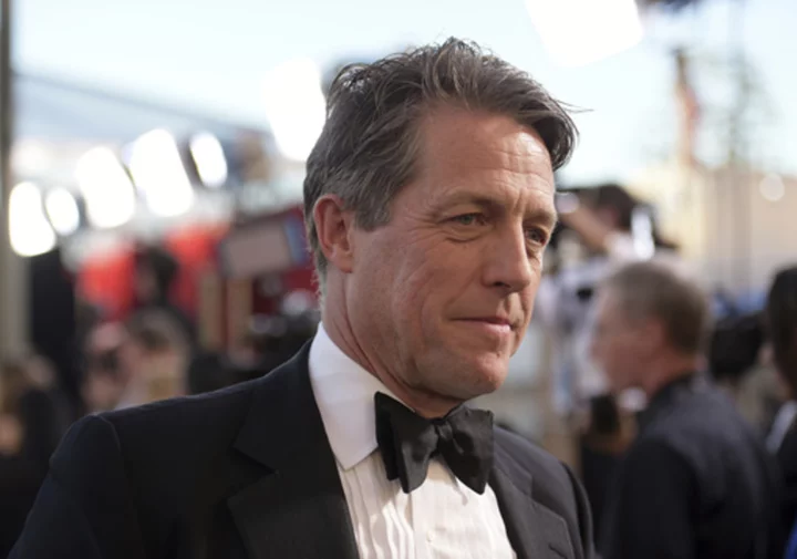 Court says Hugh Grant's lawsuit alleging illegal snooping by The Sun tabloid can go to trial