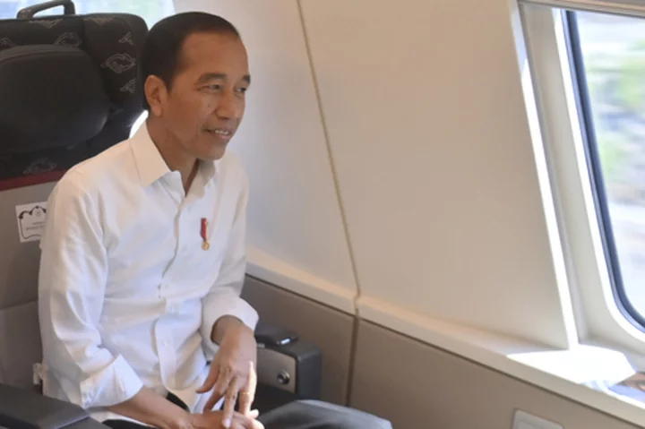 Indonesian leader takes a test ride on Southeast Asia's first high-speed railway