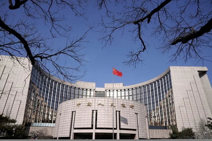 China to cut banks' FX reserve ratio to rein in yuan weakness