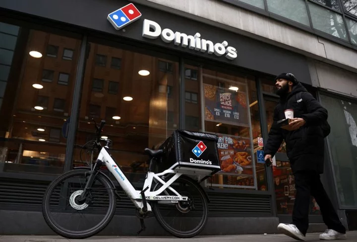 UK's Domino's Pizza reports higher sales despite delivery slowdown