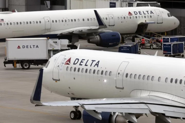 Delta puts up record quarterly numbers as travel surges despite expectations of a spending pullback