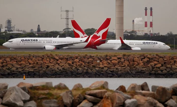 Australia's Rex cuts flights, blames rivals including Qantas of 'pillaging' pilots
