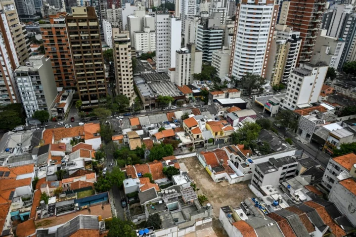 High-rises sweep Sao Paulo, but boom casts shadows