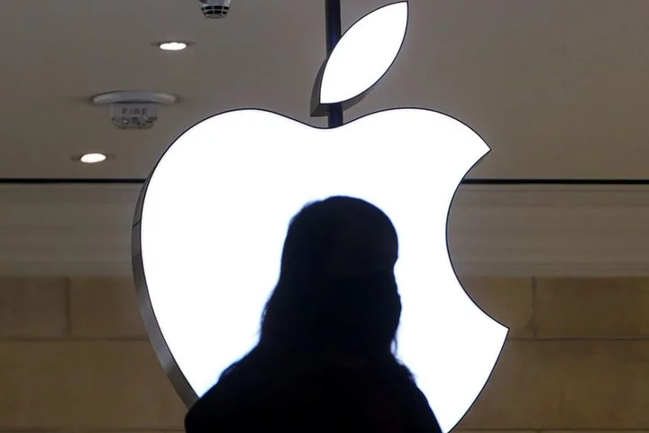 Apple's stock hits record, on cusp of $3 trillion market value