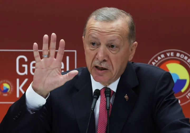 Erdogan hints at rate hike after election victory