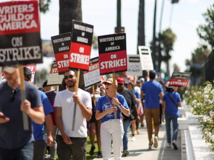 Writers Guild board votes to authorize members to go back to work