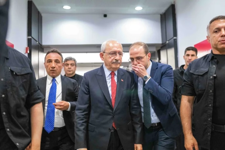 Erdogan confronts polarised Turkey after historic win
