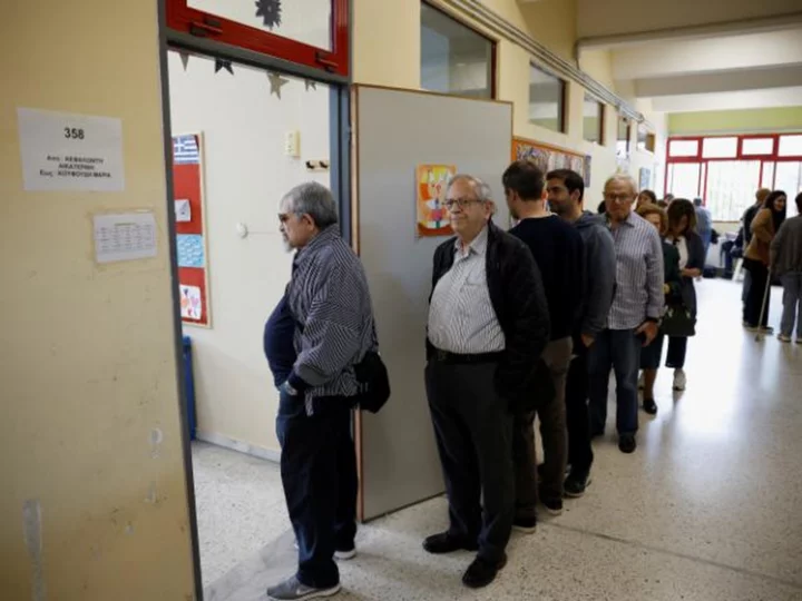 Greece's ruling conservatives take commanding lead in elections but fail to secure outright majority