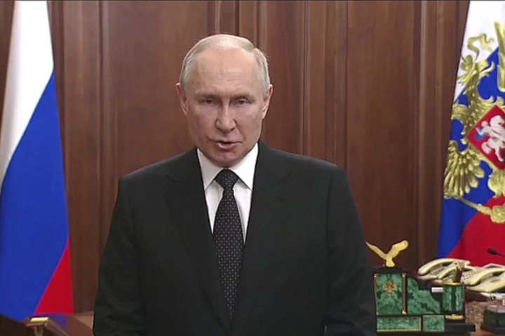 Putin calls armed rebellion by mercenary chief a betrayal and vows to defend Russia