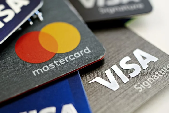 Visa, Mastercard Drop as Fed Eyes Changes to Debit-Card Fee Cap