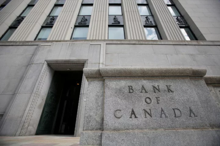 Bank of Canada holds interest rate at 5%, sees weak growth and stubborn inflation