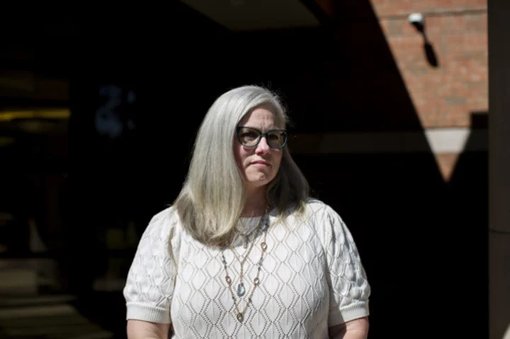A health official in Michigan is taking her county to court over $4 million resignation offer