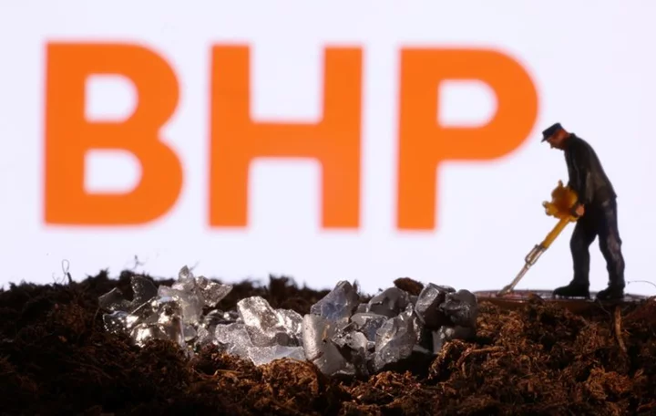 BHP sees China demand bright spots, logs 37% profit drop
