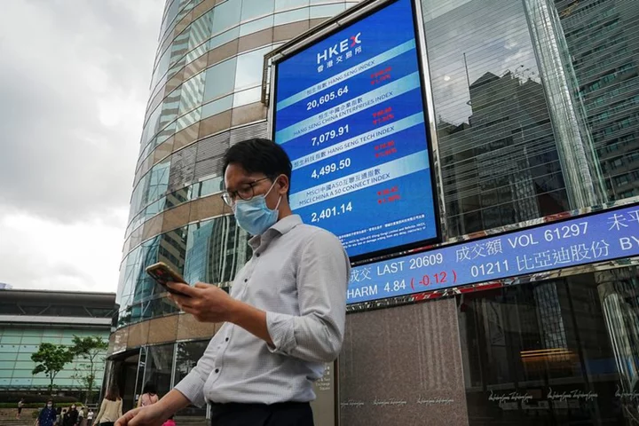 Asia shares slip as China casts a pall, dollar's slide abates